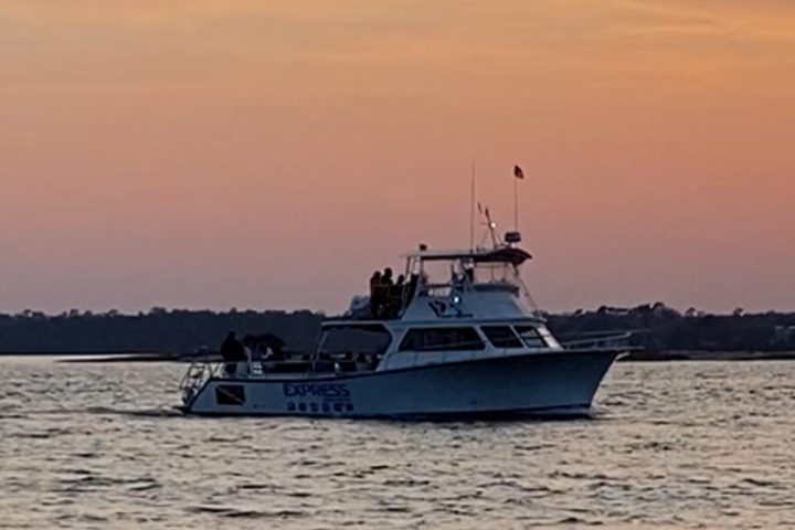 a boat floating on a body of water